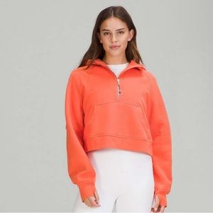 Warm coral Lululemon half zip scuba